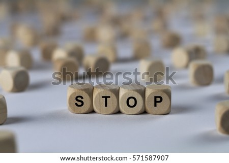 stop - cube with letters, sign with wooden cubes