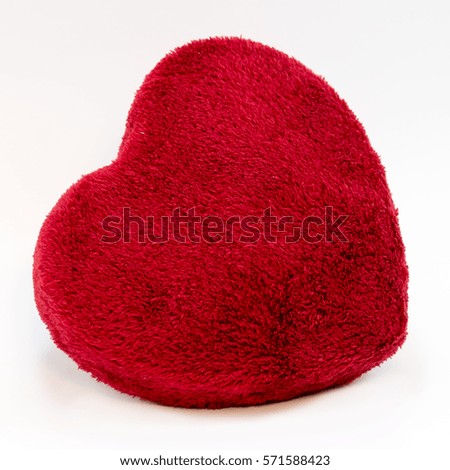 Heart of soft fabric on a white background.