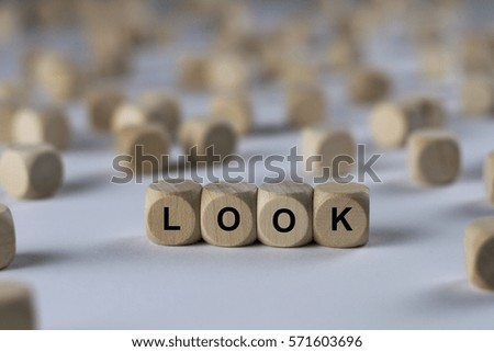 look - cube with letters, sign with wooden cubes