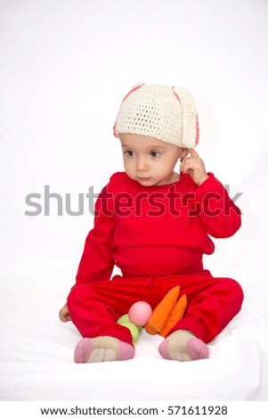 Baby girl with bunny hat isolated