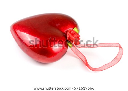 red heart with a ribbon for hanging isolated on white background