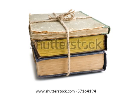 stack of old books tied with rope  isolated on white