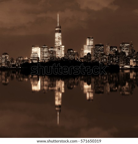 New York City at night panorama with urban architectures and reflections 
