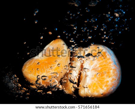 Mandarins in the water