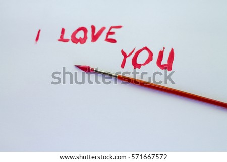 The inscription of red paint, "I love you"