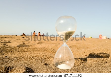 Photo Picture of Hourglass Clock on the Sand Beach