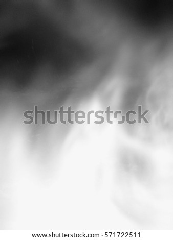 A white smoke texture on a dark background.