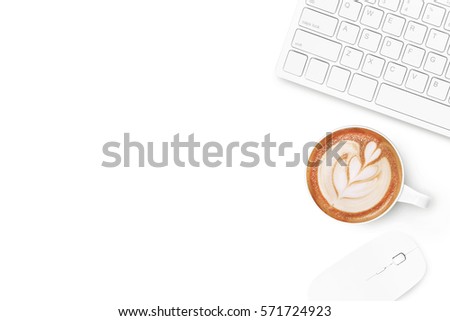 White minimal office desk table with computer mouse, keyboard and coffee. Top view with copy space, flat lay.