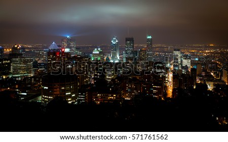 Montreal cityscape at night from top of the hill