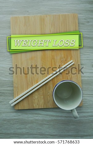 Diet and healthy lifestyle concept with word WEIGHT LOSS