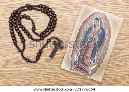 Virgin of Guadalupe and Rosary Royalty-Free Stock Photo #571776664