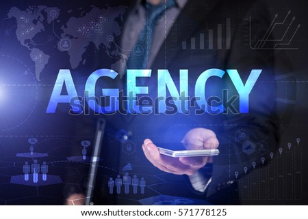 Businessman Use Smartphone And Selecting Agency, Touch Screen. Virtual Icon. Graphs Interface. Business concept. Internet concept. Digital Interfaces