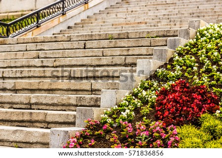 A large stone staircase. Landscape design, greening urban areas. Major European city. On the geographical border of Europe and Asia. Landscaped walking area. Vacation in Yekaterinburg.