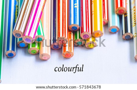 Word COLOURFUL written on Color pencils isolated on white background for background and education material back to school and motivation