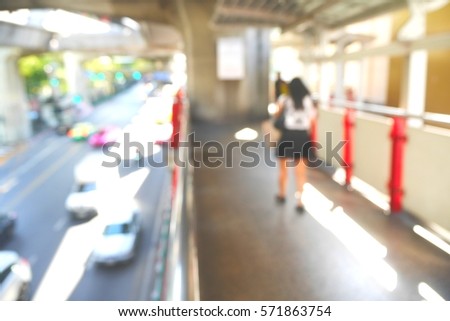 Picture blurred  for background abstract and can be illustration to article of people walking on skywalk