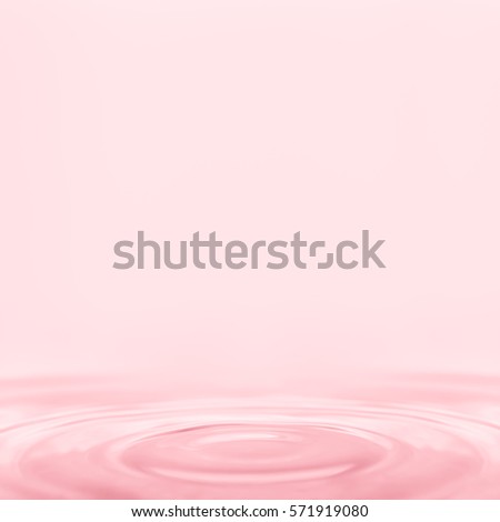 Simple pink background with a circular water ripple