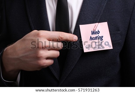 Business, Technology, Internet and network concept. Young businessman shows the word: Web hosting
