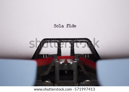 Landscape Close Up of Sola Fide Typed on Vintage Typewriter