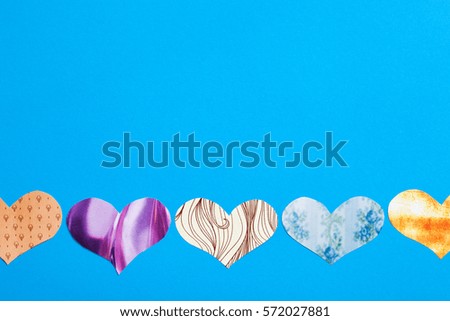 holiday letter. multicolored hearts on a blue background. greeting card
