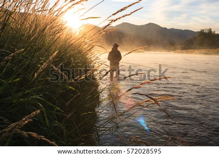 Fly Fishing The Snake River Royalty-Free Stock Photo #572028595