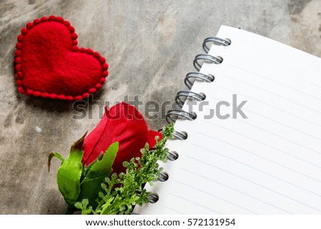 Valentines day background. Valentine hearts with open blank notebook on dark wooden background. Writing romantic letters