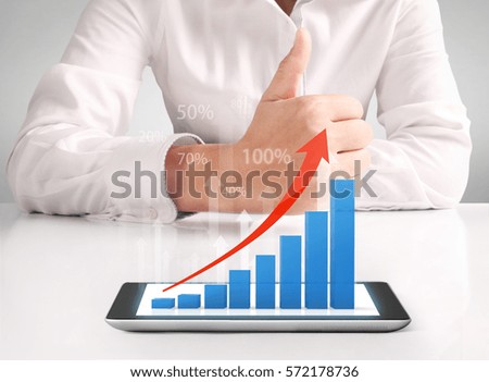 hands holding and pointing on contemporary digital tablet