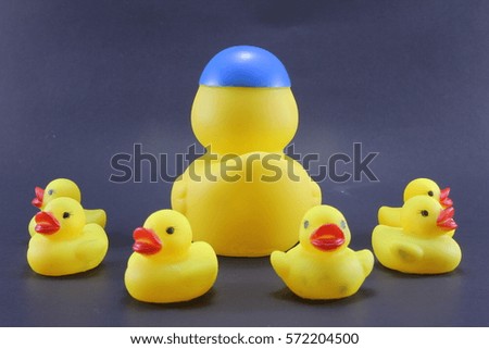Yellow rubber duck on black Background 