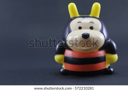 Plush bee on black