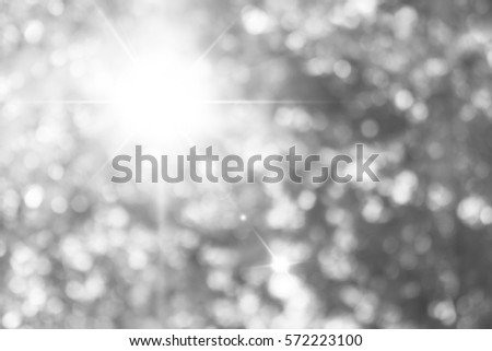 Beautiful glittering white silver backgrounds with lighting white silver bokeh effect on picture, Silver white glitter background