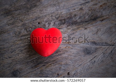 red heart on Wooden floor background, Valentine day idea.
