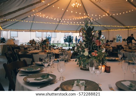 Dinner Table at Wedding Reception Royalty-Free Stock Photo #572288821