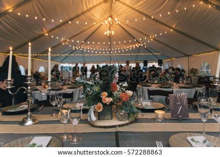 Dinner Table at Wedding Reception Royalty-Free Stock Photo #572288863