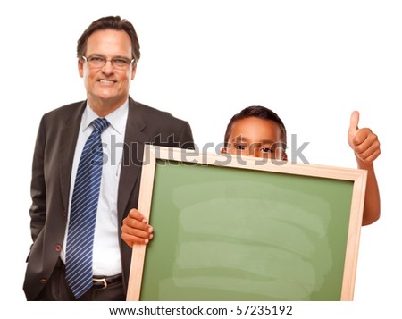 Hispanic Boy Holding Chalk Board with Male Teacher Behind Isolated on a White Background.