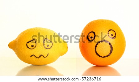 yellow lemon and orange on white