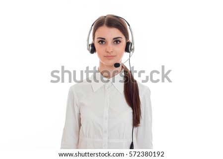 young beautiful call office girl in white shirt with headphones isolated on  background in studio
