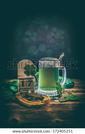 Composition for St. Patrick's Day on rustic wooden background
