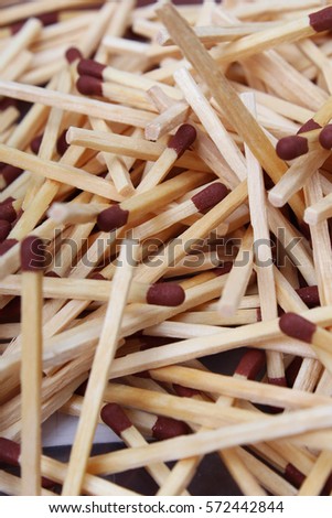 Match sticks with brown heads in a row. Fire Matches texture pattern concept. Stacked matches as background