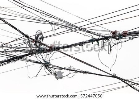 The electrical wires on a white background. Electric cables against heaven with clouds in Asia. Transmission Line cables, Thailand. 