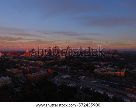 As the Sun First Rises over the City of Atlanta.  Downtown Aerial View in the Morning.  Sun First Shines on Downtown
