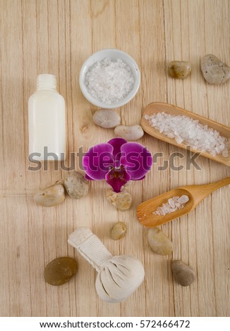 Beauty and spa concept with spa set on wooden background