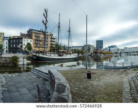 Sailboat neat Museum aan de Stroom in Antwerp; Belgium Royalty-Free Stock Photo #572466928