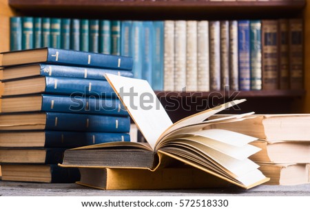 Old books in the Library . Royalty-Free Stock Photo #572518330