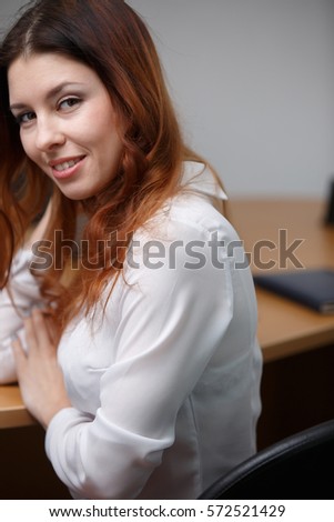 Photo of woman in white shirt
