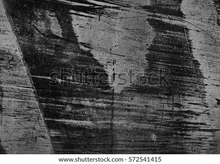 The texture of painted iron with scratches. Horizontal background. Grunge. Black and white photo.