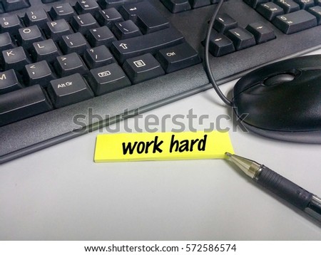 Wordings on sticky notes on keyboard and mouse background
