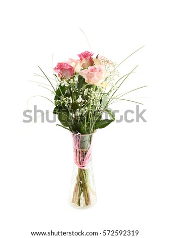 Bouquet of roses in a glass vase, composition isolated over the white background