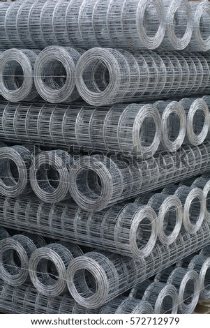 Rolls of wire mesh on a pallet  in a warehouse