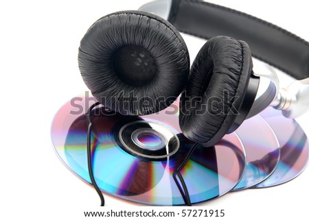 headphone and compact discs on a white background