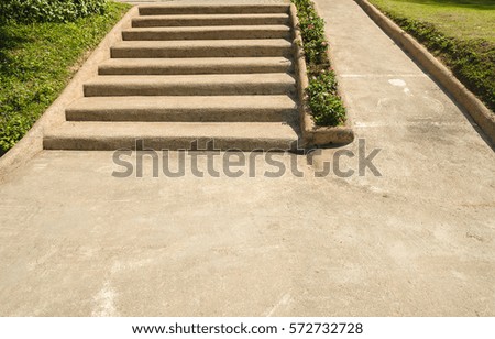 Steps for the People and the road for a wheelchair.