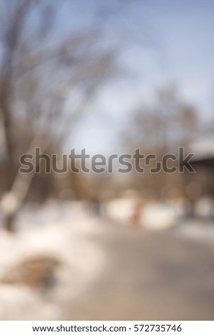 Abstract urban background with blurred buildings and street, shallow depth of focus.a